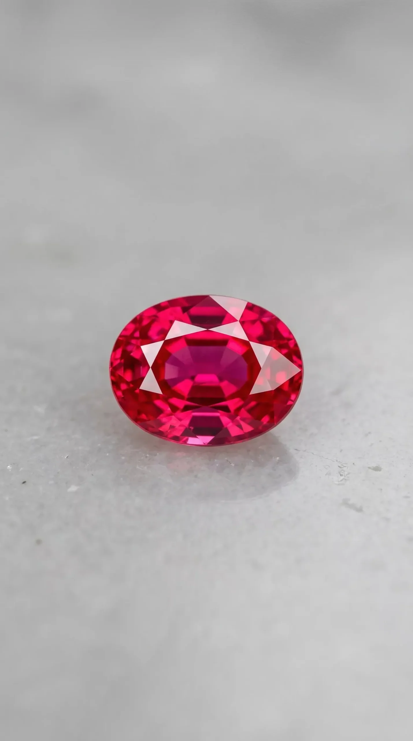 Top face view of natural Mahenge pink spinel oval cut 1.50 carats