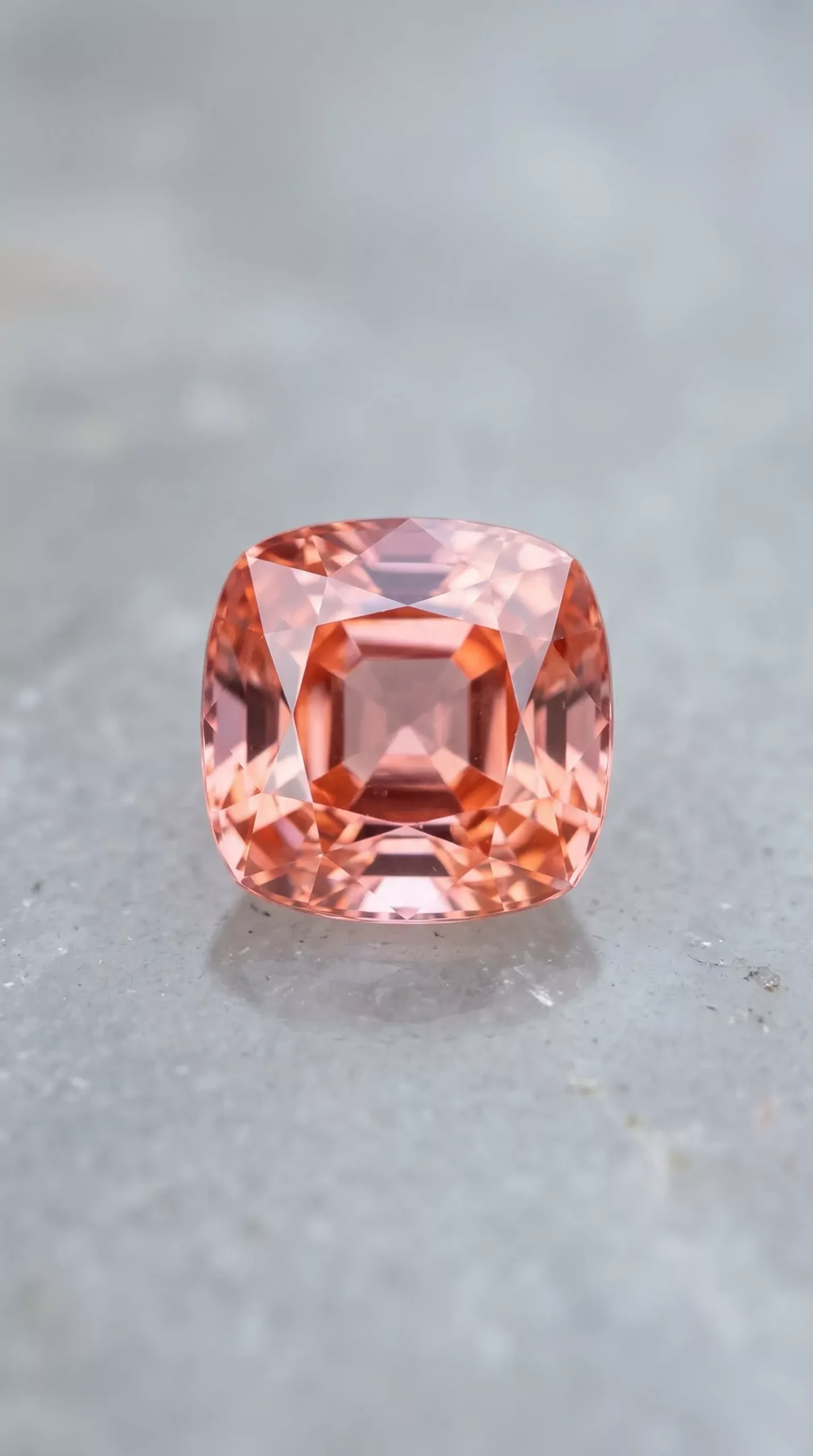 Top view of unheated pink-orange padparadscha cushion cut 2.00 carats thumbnail